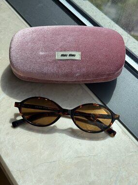 Miu Miu Tortoise Shell Sunglasses - Classic Luxury Shades